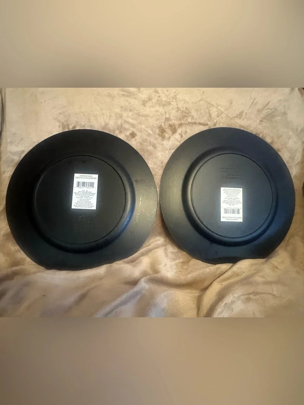 Set of 2 metallic brown plate chargers.